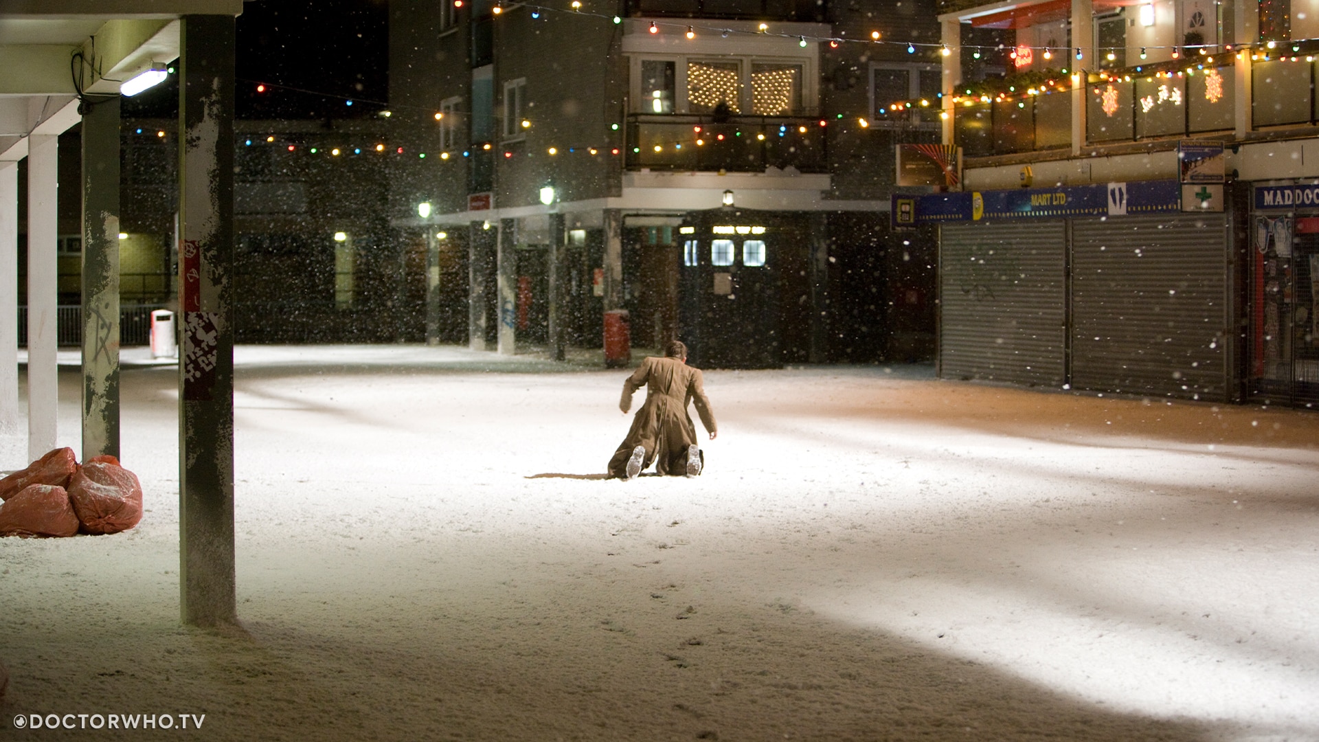 David Tennant as the Tenth Doctor at the same location on the Powell Estate, preparing to regenerate  in 'The End of Time: Part Two'