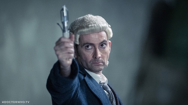 The Fourteenth Doctor in action with his sonic screwdriver.