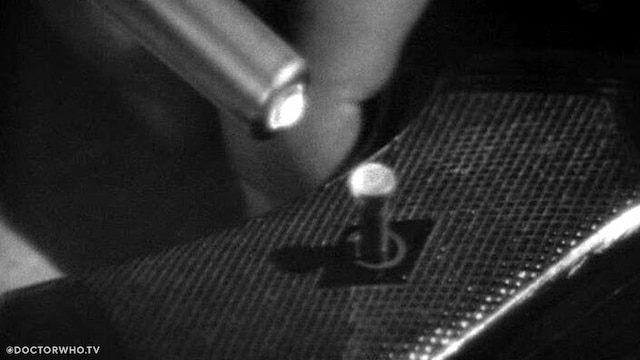 The Second Doctor's sonic screwdriver in action, unscrewing some screws.