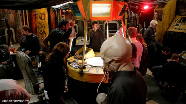 The cast and crew between takes of 'The Impossible Planet'.