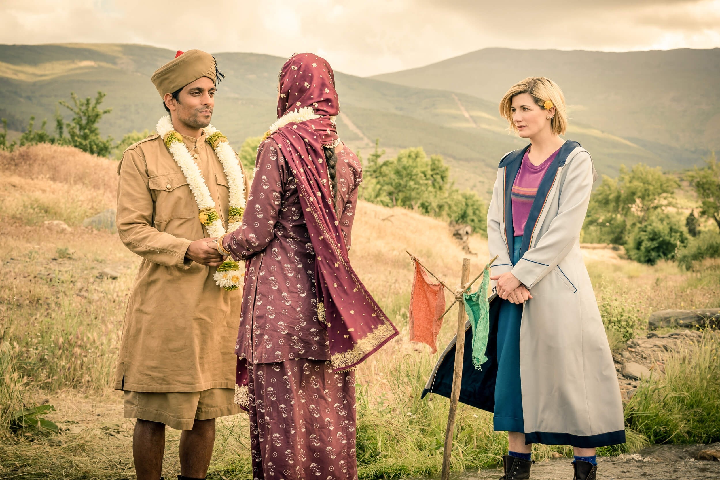 the thirteenth doctor (jodie whittaker) at the wedding of prem (shane zaza) and umbreen (amita suman) in demons of the punjab (2018).