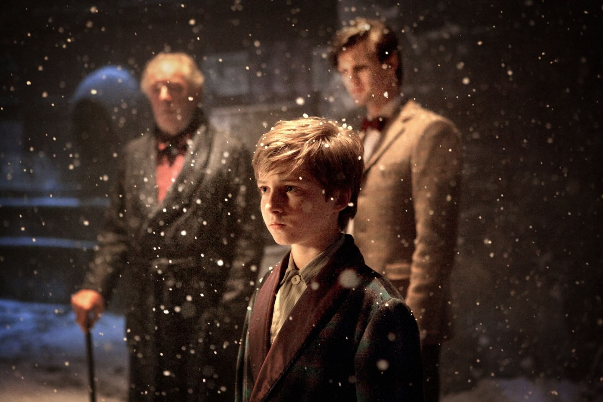 michael gambon as kazran, laurence belcher as young kazran and matt smith as the eleventh doctor.