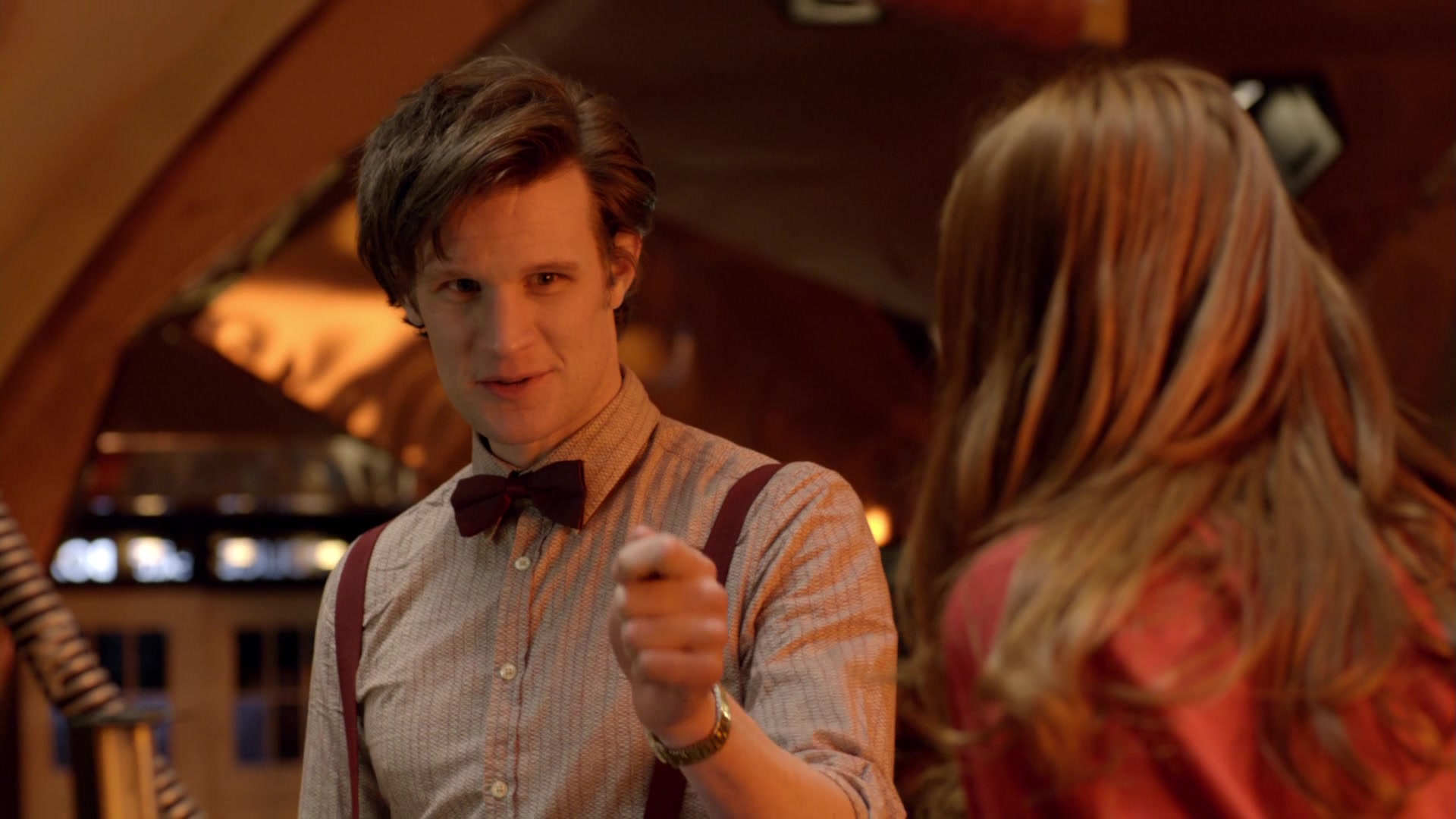 The Eleventh Doctor (Matt Smith) talks to Amy Pond (Karen Gillan) inside his TARDIS