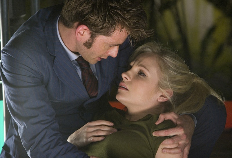 Image of David Tennant as the Tenth Doctor holding Georgia Tennant in his arms