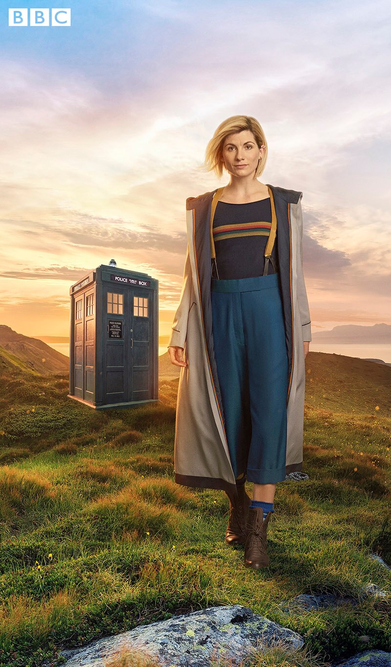 Image of Jodie Whittaker as The Thirteenth Doctor with the TARDIS in the background