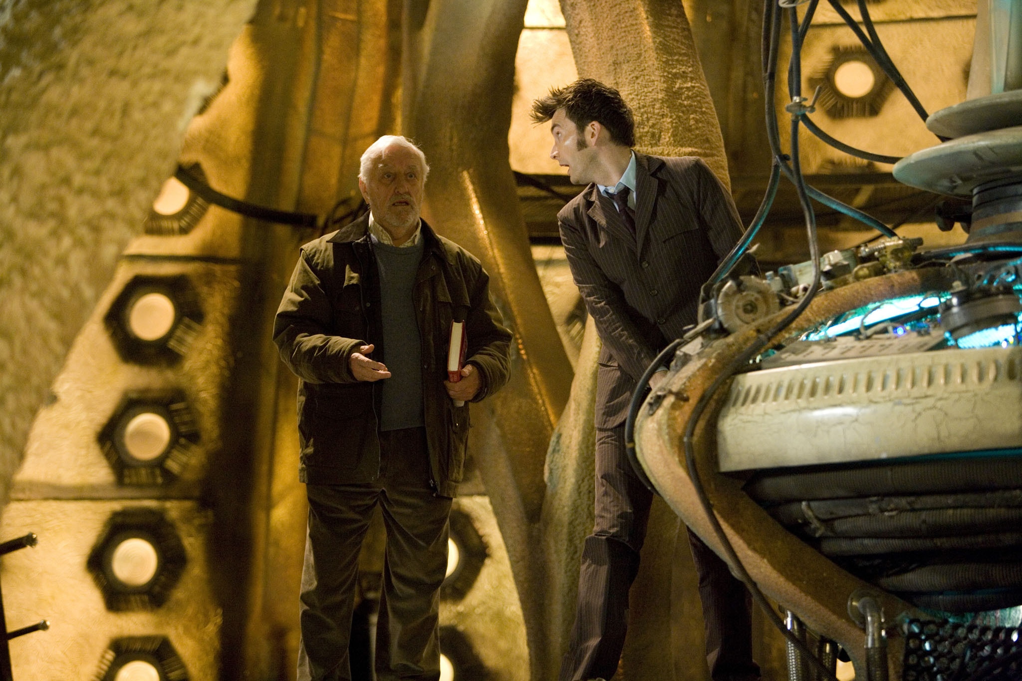 A still from 'The End of Time: Part 2' featuring David Tennant as the Doctor and Bernard Cribbins as Wilfred Mott. The Doctor and Wilf are standing in the TARDIS console room.
