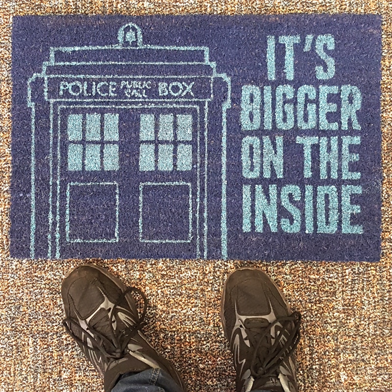 Image of a blue doormat with the TARDIS on it